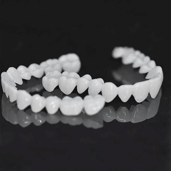 A close-up view of a set of snap-on dentures with a natural-looking appearance, designed to transform your smile instantly.