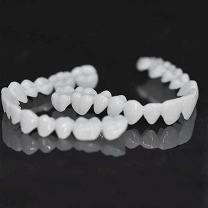 A close-up view of a set of snap-on dentures with a natural-looking appearance, designed to transform your smile instantly.