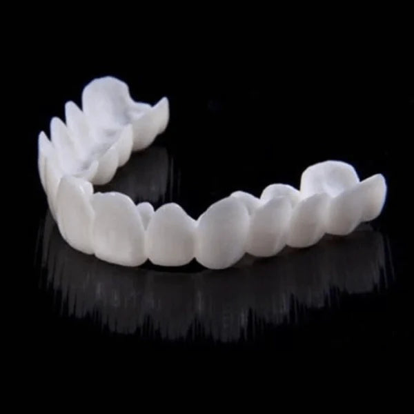 A close-up view of a set of snap-on dentures with a natural-looking appearance, designed to transform your smile instantly.