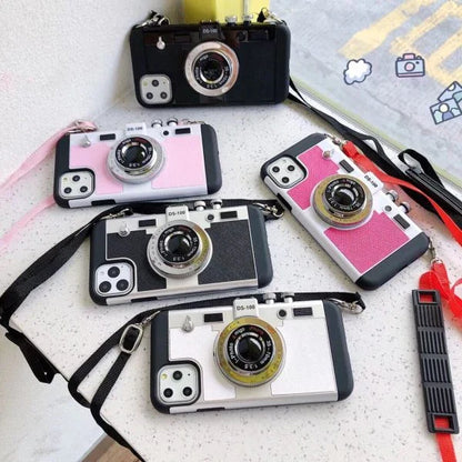 Retro-inspired shatterproof phone case with camera-style design, available in black, brown, and gray colors for iPhone 12/13 models.