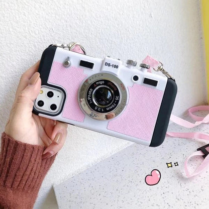 Retro-inspired shatterproof phone case with camera-style design, available in black, brown, and gray colors for iPhone 12/13 models.