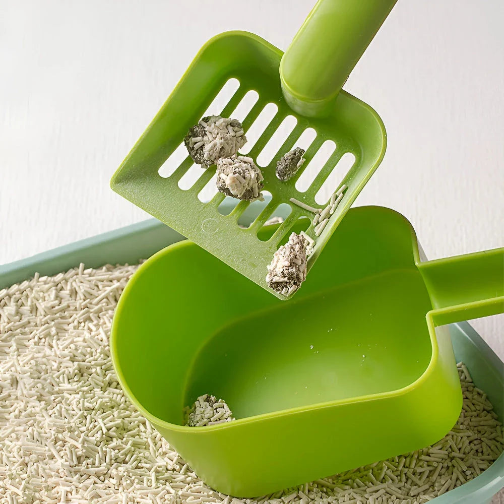 Plastic cat litter scoop with self-cleaning base for efficient and hassle-free litter box cleaning