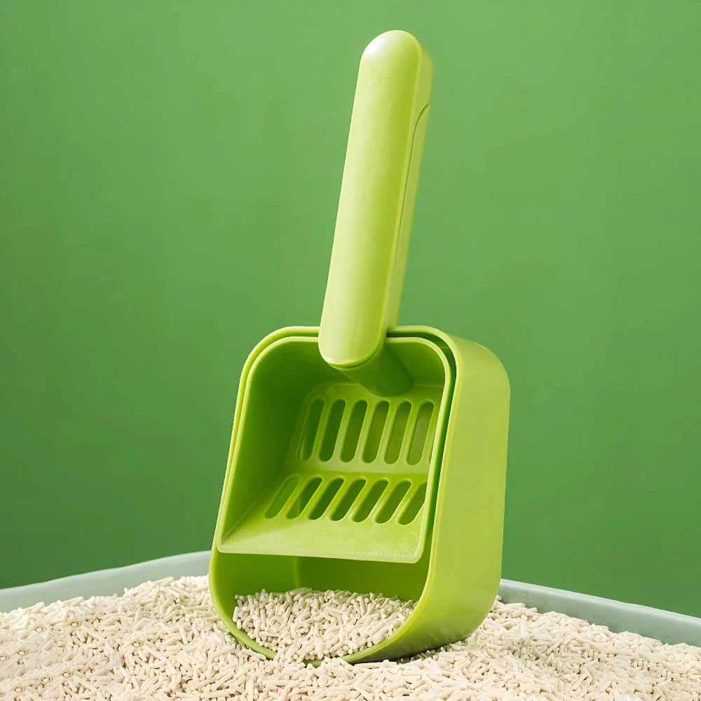 Plastic cat litter scoop with self-cleaning base for efficient and hassle-free litter box cleaning