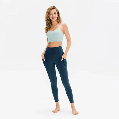 High-waist yoga leggings for women with pockets, made from a stretch fabric blend for comfort and support during workouts and everyday wear.