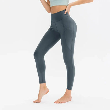 High-waist yoga leggings for women with pockets, made from a stretch fabric blend for comfort and support during workouts and everyday wear.