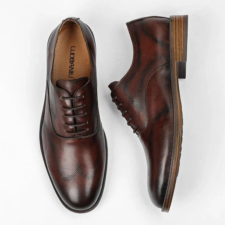 Men's low-top business dress shoes in a polished British retro style, crafted from high-quality cowhide for lasting comfort and sophistication.