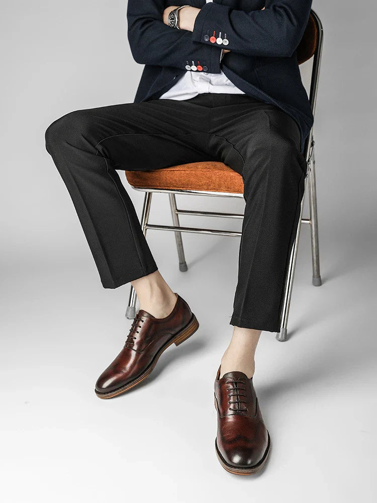 Men's low-top business dress shoes in a polished British retro style, crafted from high-quality cowhide for lasting comfort and sophistication.