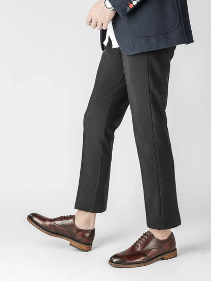Men's low-top business dress shoes in a polished British retro style, crafted from high-quality cowhide for lasting comfort and sophistication.