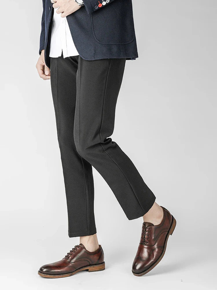 Men's low-top business dress shoes in a polished British retro style, crafted from high-quality cowhide for lasting comfort and sophistication.