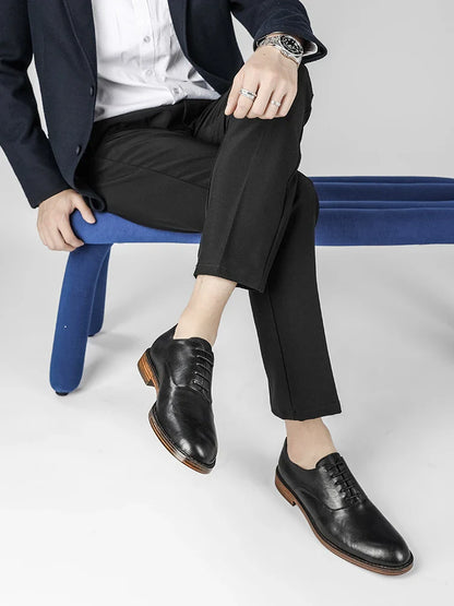 Men's low-top business dress shoes in a polished British retro style, crafted from high-quality cowhide for lasting comfort and sophistication.