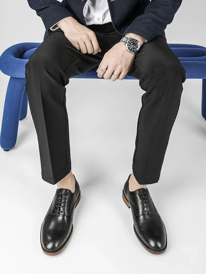 Men's low-top business dress shoes in a polished British retro style, crafted from high-quality cowhide for lasting comfort and sophistication.