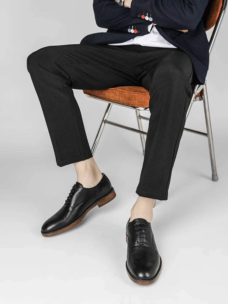 Men's low-top business dress shoes in a polished British retro style, crafted from high-quality cowhide for lasting comfort and sophistication.