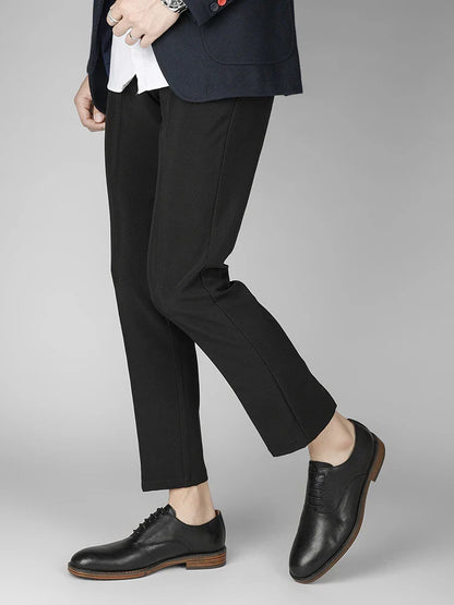 Men's low-top business dress shoes in a polished British retro style, crafted from high-quality cowhide for lasting comfort and sophistication.