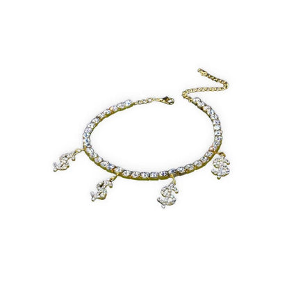 Fashionable gold-colored anklet with four dollar-shaped pendants adorned with rhinestones