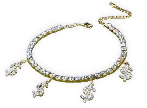 Fashionable gold-colored anklet with four dollar-shaped pendants adorned with rhinestones