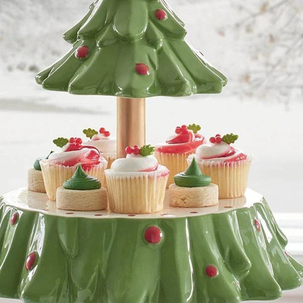 A two-tier Christmas tree-shaped dessert stand made of high-quality materials, perfect for displaying a variety of holiday treats.