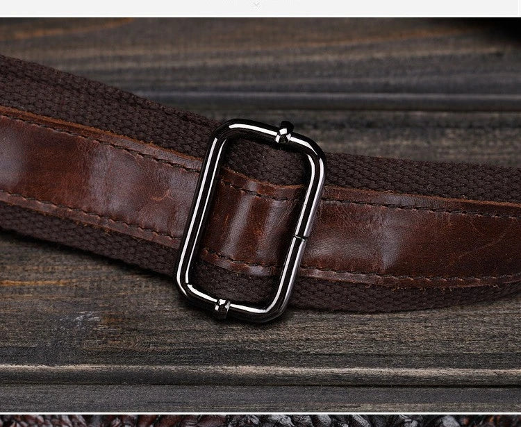 A durable, stylish leather shoulder bag with a vertical square design and multiple interior pockets for modern men's everyday use.