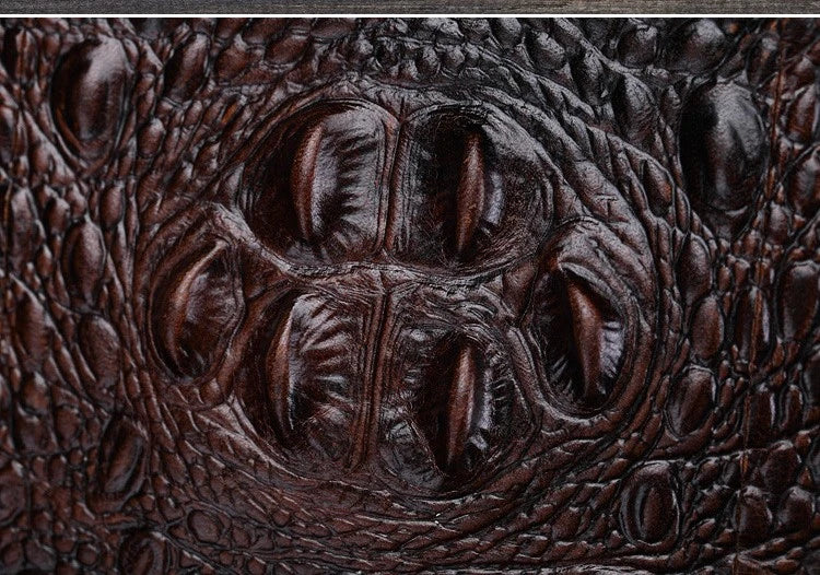 A durable, stylish leather shoulder bag with a vertical square design and multiple interior pockets for modern men's everyday use.