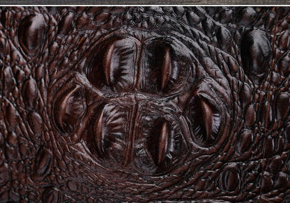 A durable, stylish leather shoulder bag with a vertical square design and multiple interior pockets for modern men's everyday use.