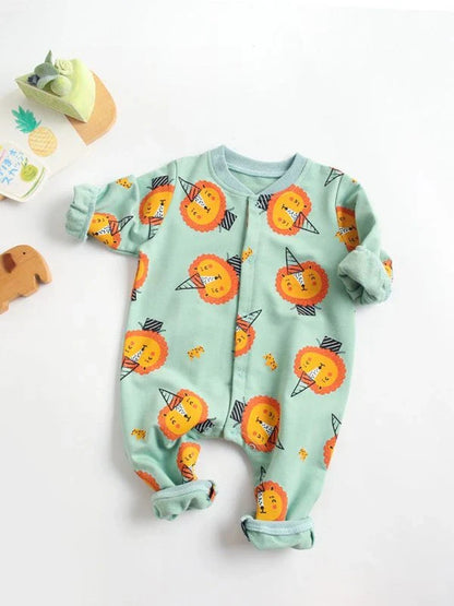 Adorable baby wearing a cartoon-printed long-sleeved romper, playing and exploring comfortably.