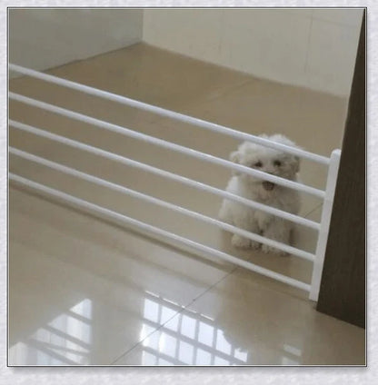 Retractable baby and pet safety gate with adjustable width and sturdy design for secure home protection