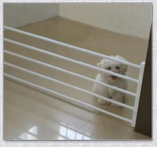Retractable baby and pet safety gate with adjustable width and sturdy design for secure home protection