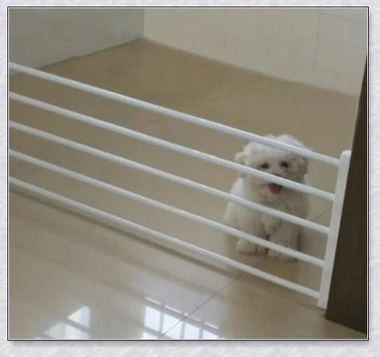 Retractable baby and pet safety gate with adjustable width and sturdy design for secure home protection