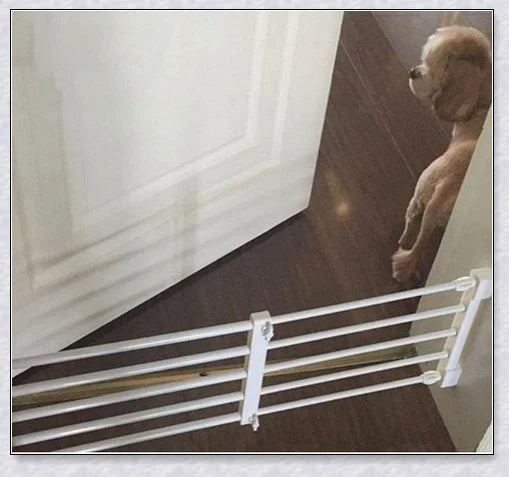 Retractable baby and pet safety gate with adjustable width and sturdy design for secure home protection