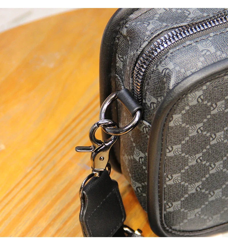 Stylish plaid crossbody bag for men's casual commute, featuring a spacious main compartment and adjustable shoulder strap