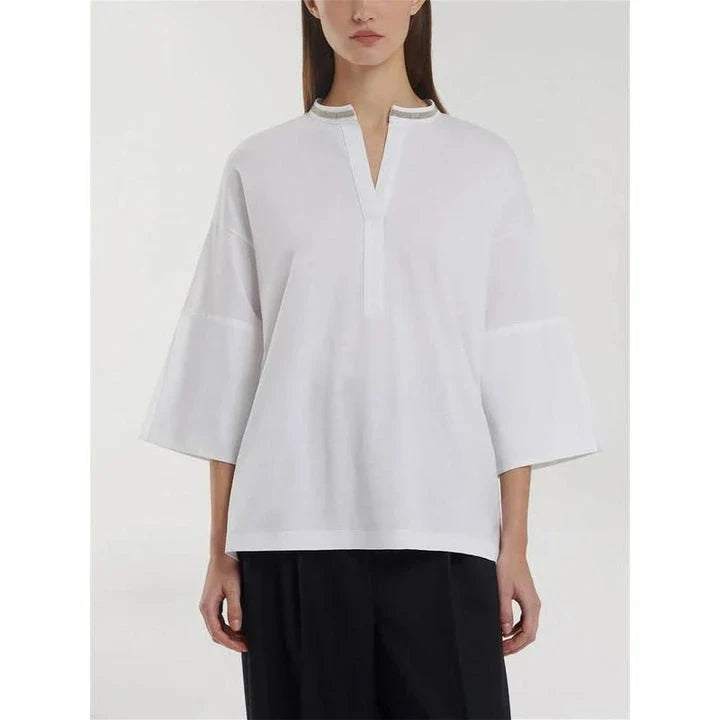 A white t-shirt with a bead chain detail around the neckline and a split hem design, perfect for summer