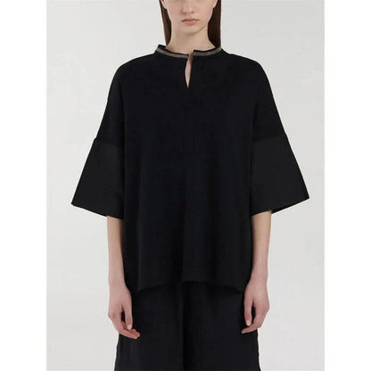 A white t-shirt with a bead chain detail around the neckline and a split hem design, perfect for summer