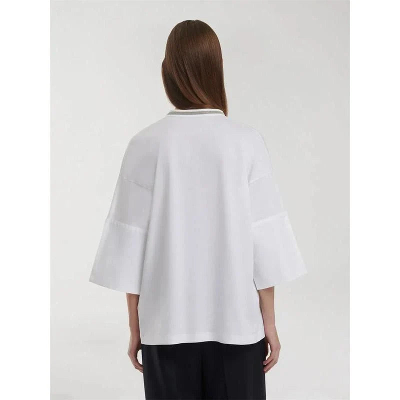 A white t-shirt with a bead chain detail around the neckline and a split hem design, perfect for summer