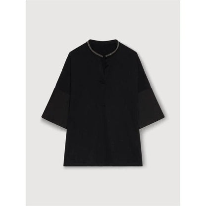 A white t-shirt with a bead chain detail around the neckline and a split hem design, perfect for summer