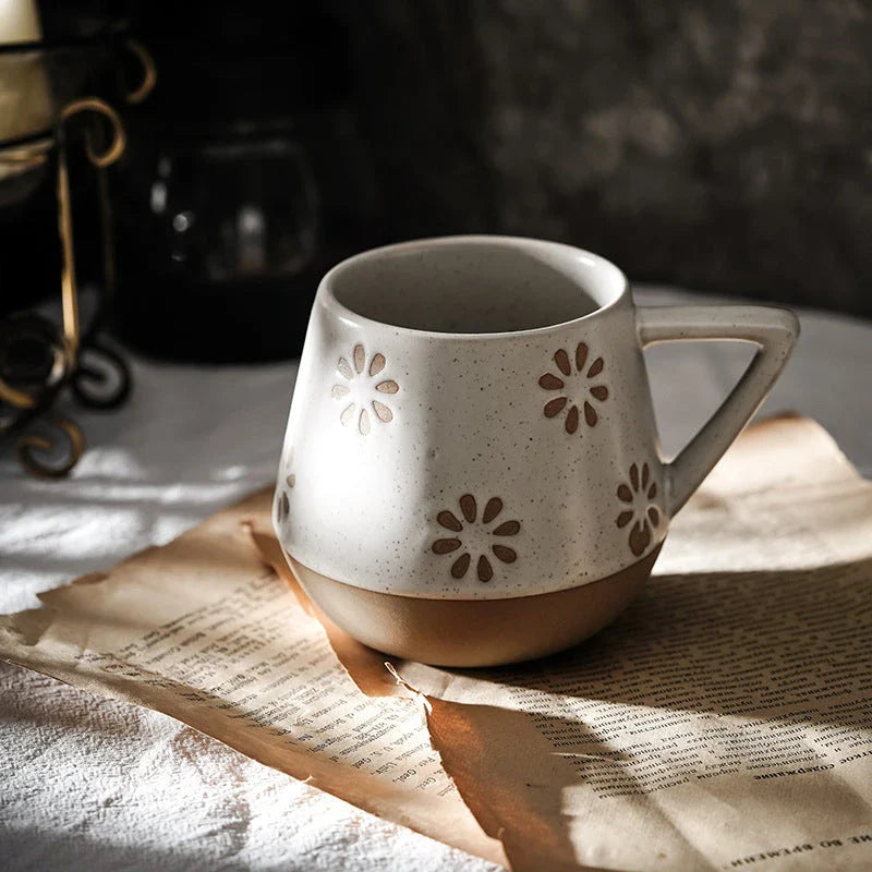 A hand-painted ceramic mug with a retro Nordic-inspired design, perfect for enjoying coffee, tea, or other hot beverages.