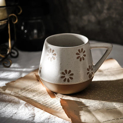 A hand-painted ceramic mug with a retro Nordic-inspired design, perfect for enjoying coffee, tea, or other hot beverages.