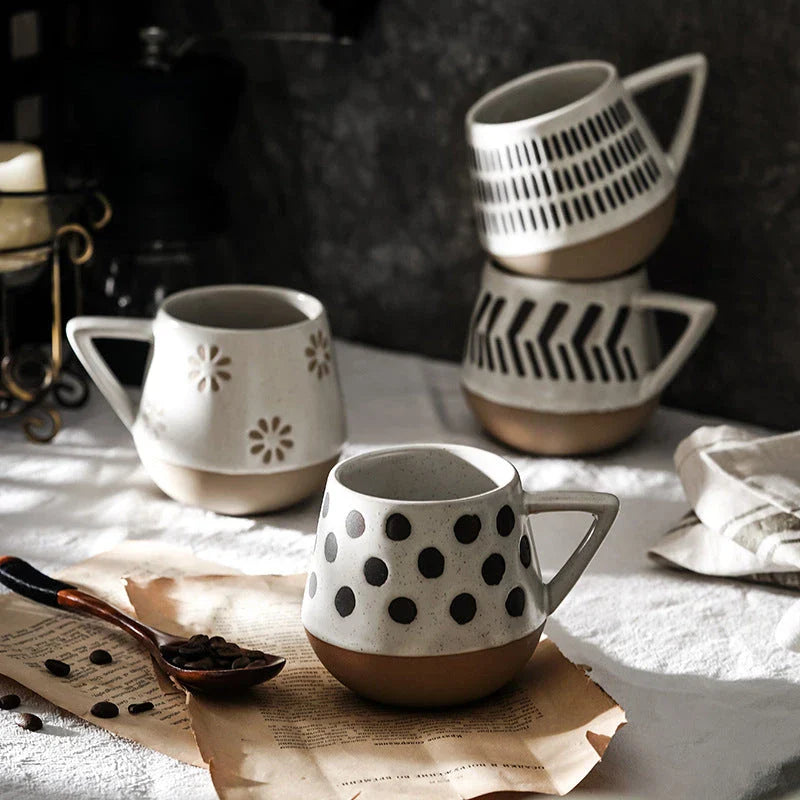 A hand-painted ceramic mug with a retro Nordic-inspired design, perfect for enjoying coffee, tea, or other hot beverages.