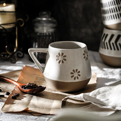 A hand-painted ceramic mug with a retro Nordic-inspired design, perfect for enjoying coffee, tea, or other hot beverages.