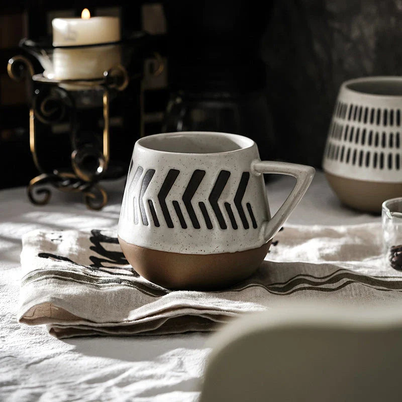A hand-painted ceramic mug with a retro Nordic-inspired design, perfect for enjoying coffee, tea, or other hot beverages.