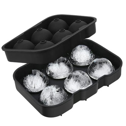 A silicone ice cube maker with 6 grid slots to produce large, round and square ice cubes for chilling whiskey, cocktails, and other beverages.