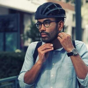 Foldable bike helmet with adjustable fit system and compact folding design for urban commuters