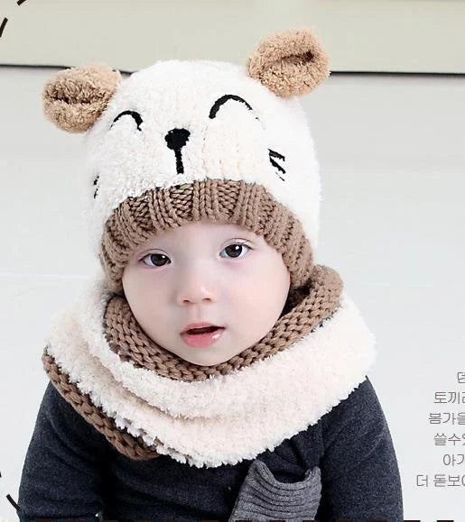 A cozy and stylish baby wool scarf and hat set in a classic striped pattern, perfect for keeping your little one warm and comfortable during the winter months.