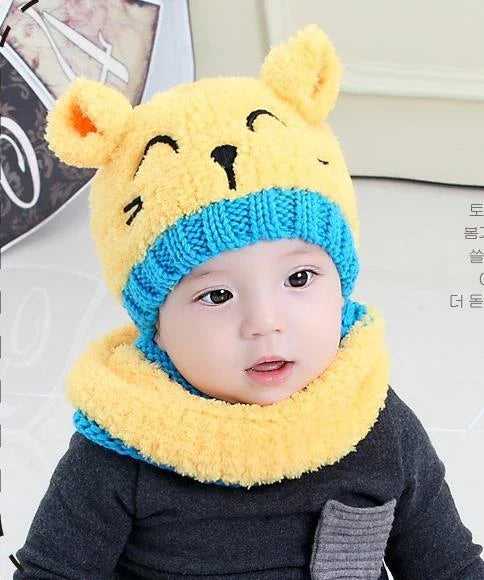 A cozy and stylish baby wool scarf and hat set in a classic striped pattern, perfect for keeping your little one warm and comfortable during the winter months.