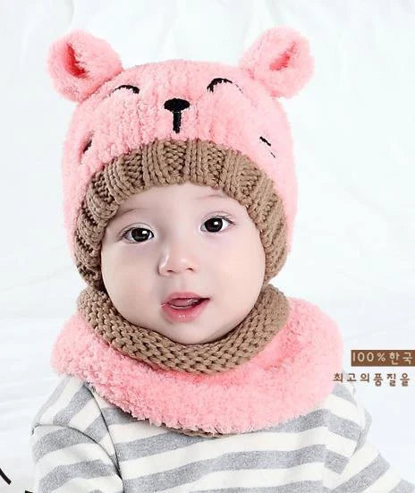 A cozy and stylish baby wool scarf and hat set in a classic striped pattern, perfect for keeping your little one warm and comfortable during the winter months.