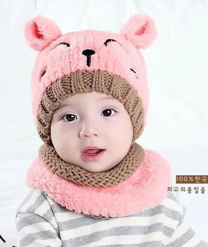 A cozy and stylish baby wool scarf and hat set in a classic striped pattern, perfect for keeping your little one warm and comfortable during the winter months.