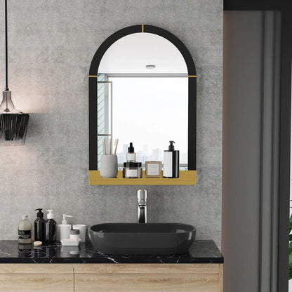 Arched black and gold wall mirror with decorative shelf, perfect for enhancing the style and functionality of any room.