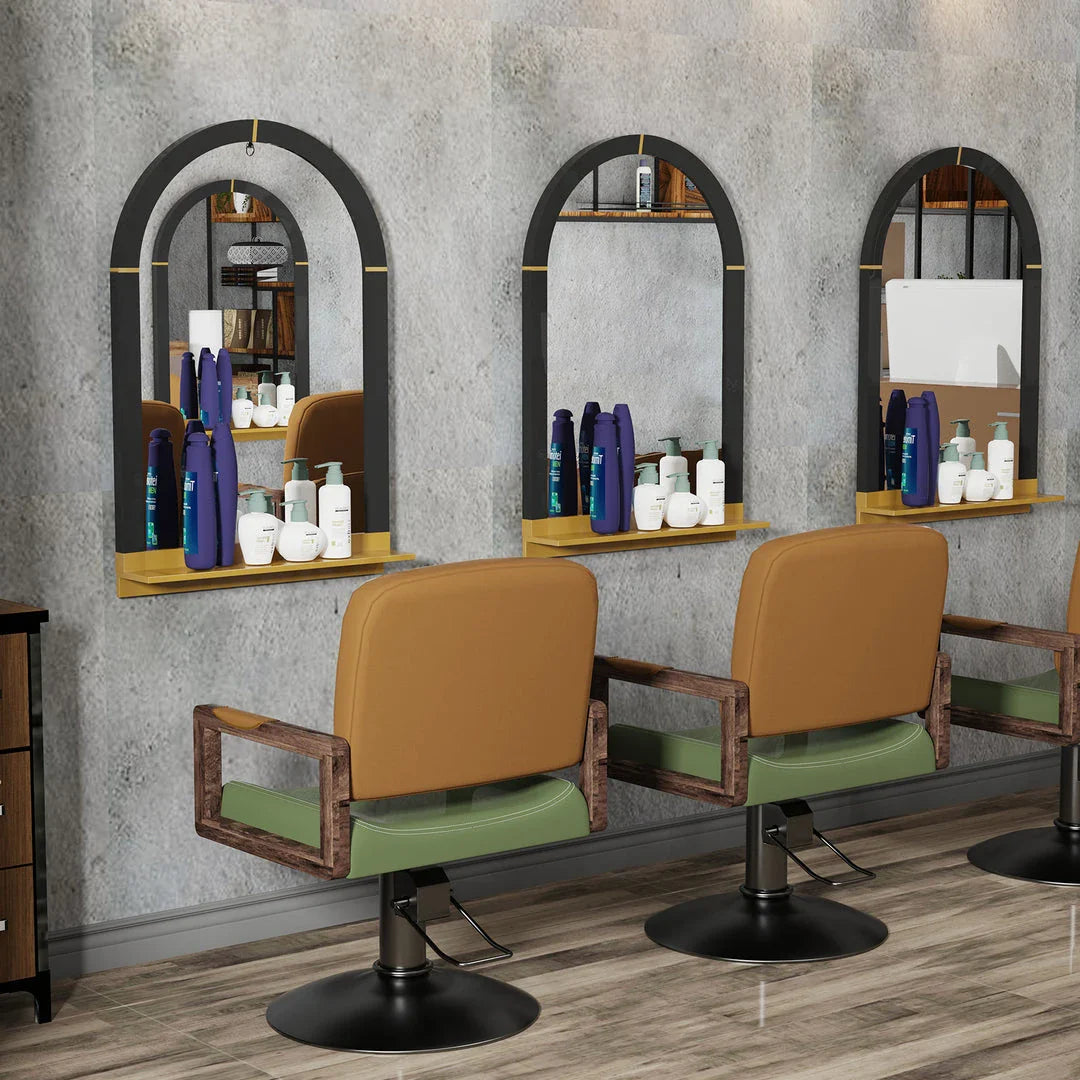 Arched black and gold wall mirror with decorative shelf, perfect for enhancing the style and functionality of any room.