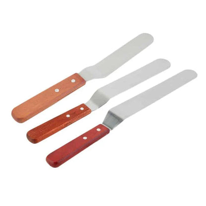 Stainless steel kitchen spatula with wooden handle, perfect for flipping, lifting, and transferring delicate foods