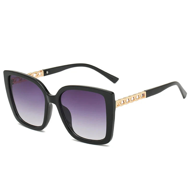 Luxury oversized square sunglasses for women with a sturdy alloy frame and gradient, mirrored lenses that offer UV protection and reduce glare.