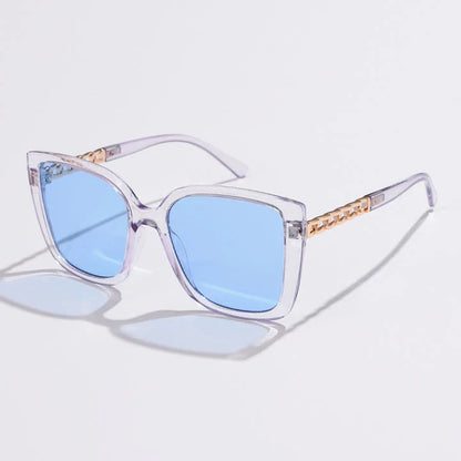 Luxury oversized square sunglasses for women with a sturdy alloy frame and gradient, mirrored lenses that offer UV protection and reduce glare.