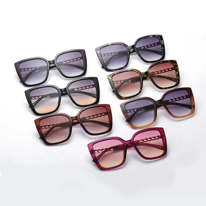 Luxury oversized square sunglasses for women with a sturdy alloy frame and gradient, mirrored lenses that offer UV protection and reduce glare.
